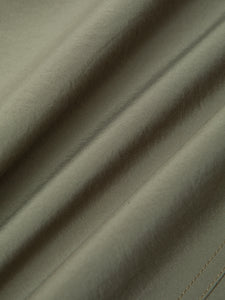 An olive green fabric from 37.5 Technology, which regulates body temperature.