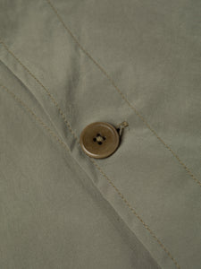 A close-up of the front of the KESTIN Port Jacket, focusing on a button.