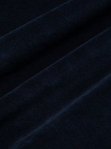 A dark navy blue moleskin fabric, used by fashion designer KESTIN