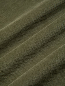 A military green moleskin fabric made from cotton and elastane