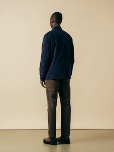 A model showing the back of the KESTIN Armadale Jacket in Navy