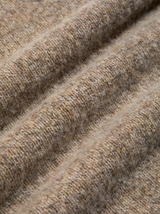 A brushed Shetland lambswool in a beige colour.