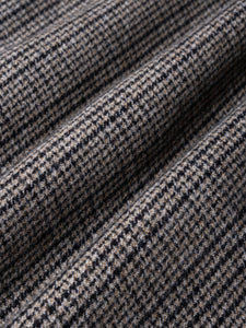 A micro check pattern on a soft brushed shirt fabric.