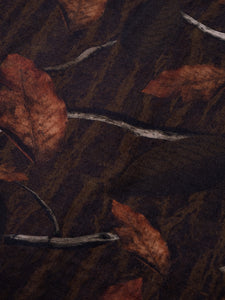 A cotton fabric with a leaf camo print, used to make an overshirt.