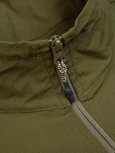 A close-up of the zippered neck of the Aberfeldy Windbreaker by designer clothing brand KESTIN.