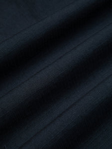 A navy blue cotton ripstop fabric used to make the KESTIN Aberfeldy Windbreaker.