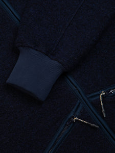 The ribbed cuf of the KESTIN Dreghorn Fleece in navy blue.