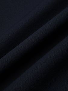 A navy blue Japanese CORDURA fabric, used to make a men's suit.