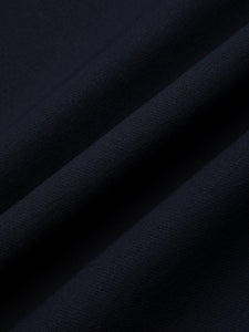 A navy blue stretch CORDURA fabric, used by KESTIN for his AW24 Collection.