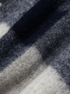 A navy blue check fabric made from Italian wool, used by menswear brand KESTIN.