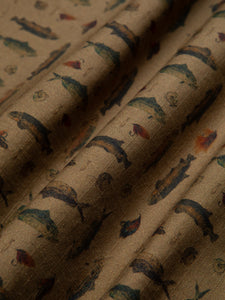 A cotton ripstop fabric with a graphic fish print.