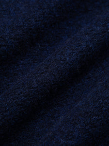 A navy blue fleece fabric used for the AW24 Collection by menswear brand KESTIN.