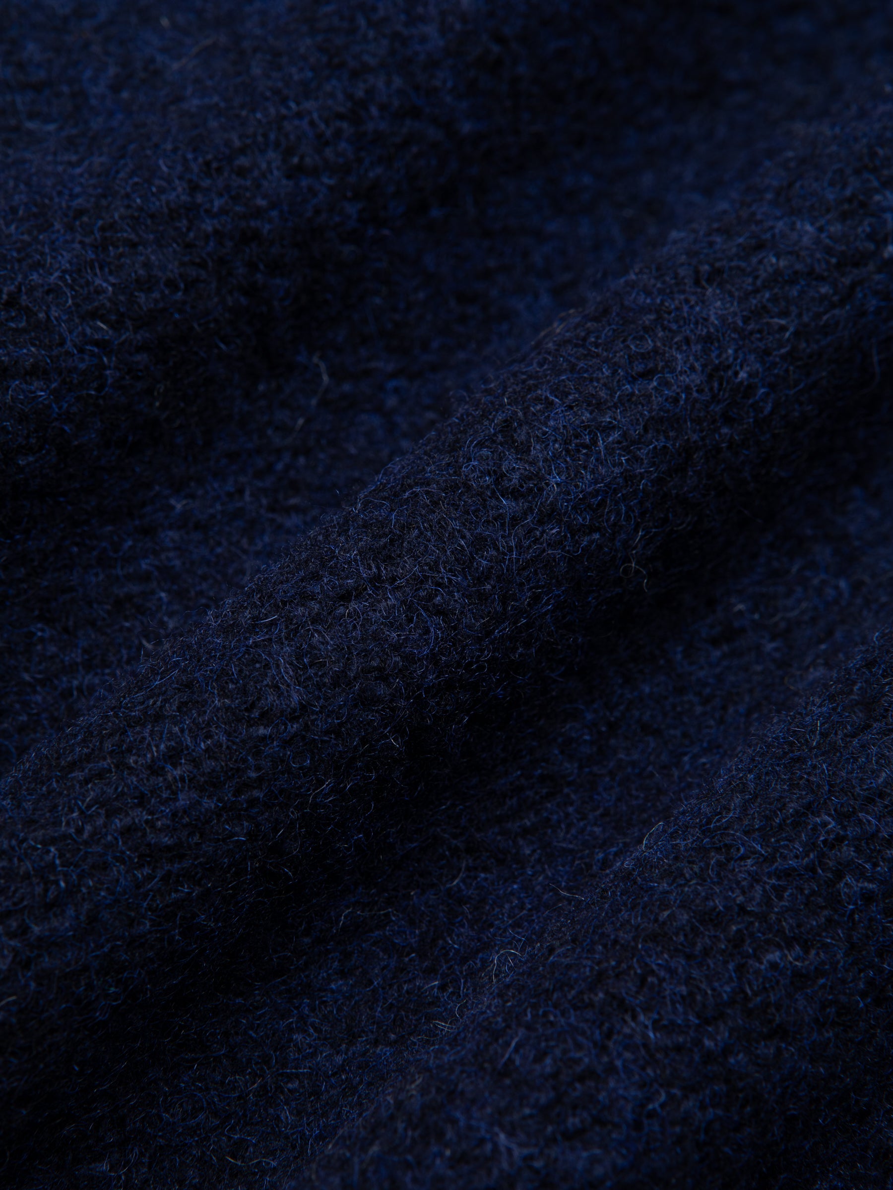 A navy blue Italian wool fleece used by KESTIN to make autumn/winter fleeces.