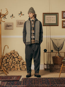 A model wearing an outfit from the fly fishing-inspired AW24 collection by KESTIN.