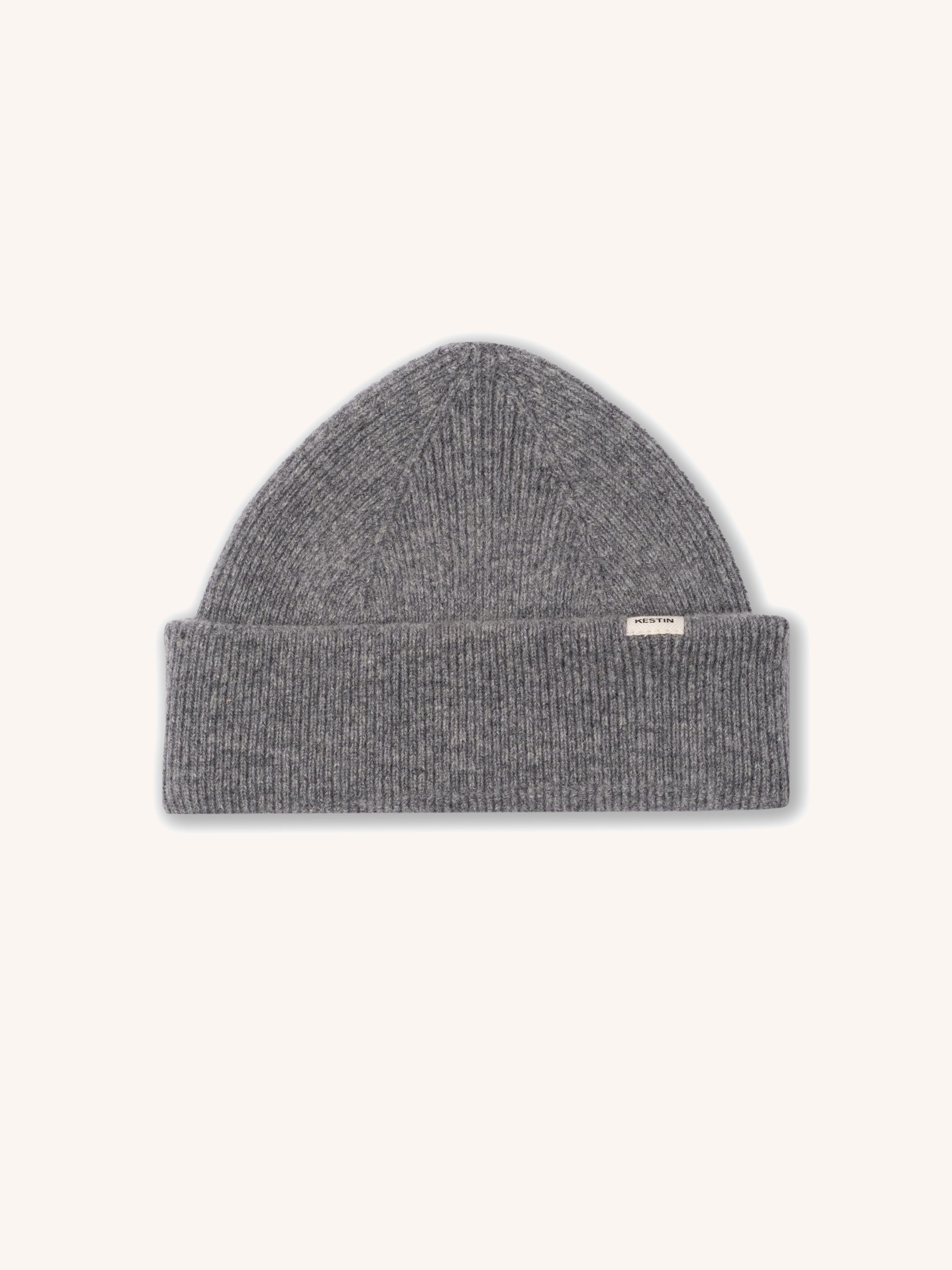 A grey knitted wool beanie from KESTIN on a white background.