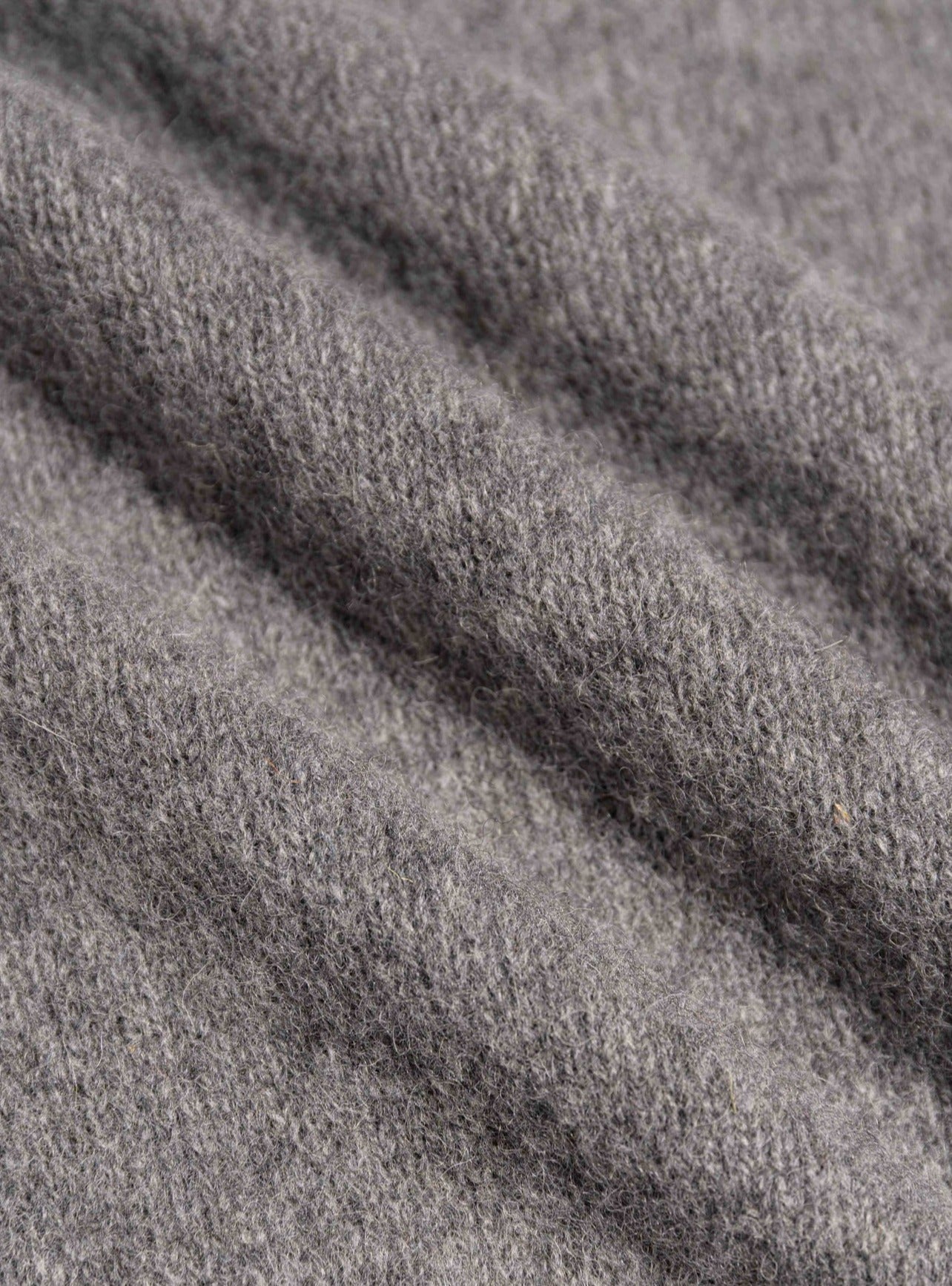 A brushed Shetland lambswool yarn in grey, used to make Scottish knitwear.