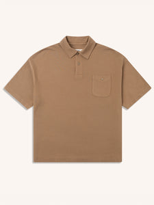 A relaxed fit polo shirt in tan brown, on a white background.