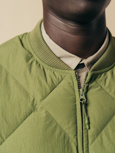 The zipped front and collar on the KESTIN Linton Vest, on a model.