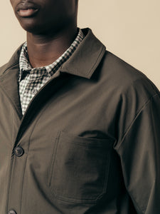 The chest pocket and lapel of the KESTIN Port Jacket in Slate.