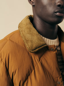 A close-up of the collar of the KESTIN Dunbar Jacket in brown.