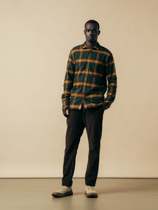 A model wearing a men's flannel shirt from Scottish designer KESTIN.