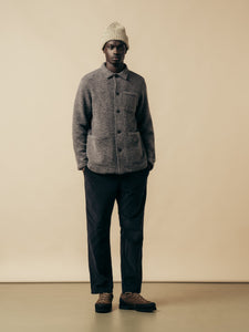 A man wearing an Autumn/Winter outfit from designer menswear brand KESTIN.