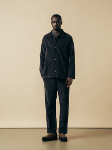 A model wearing a black moleskin suit from menswear brand KESTIN.