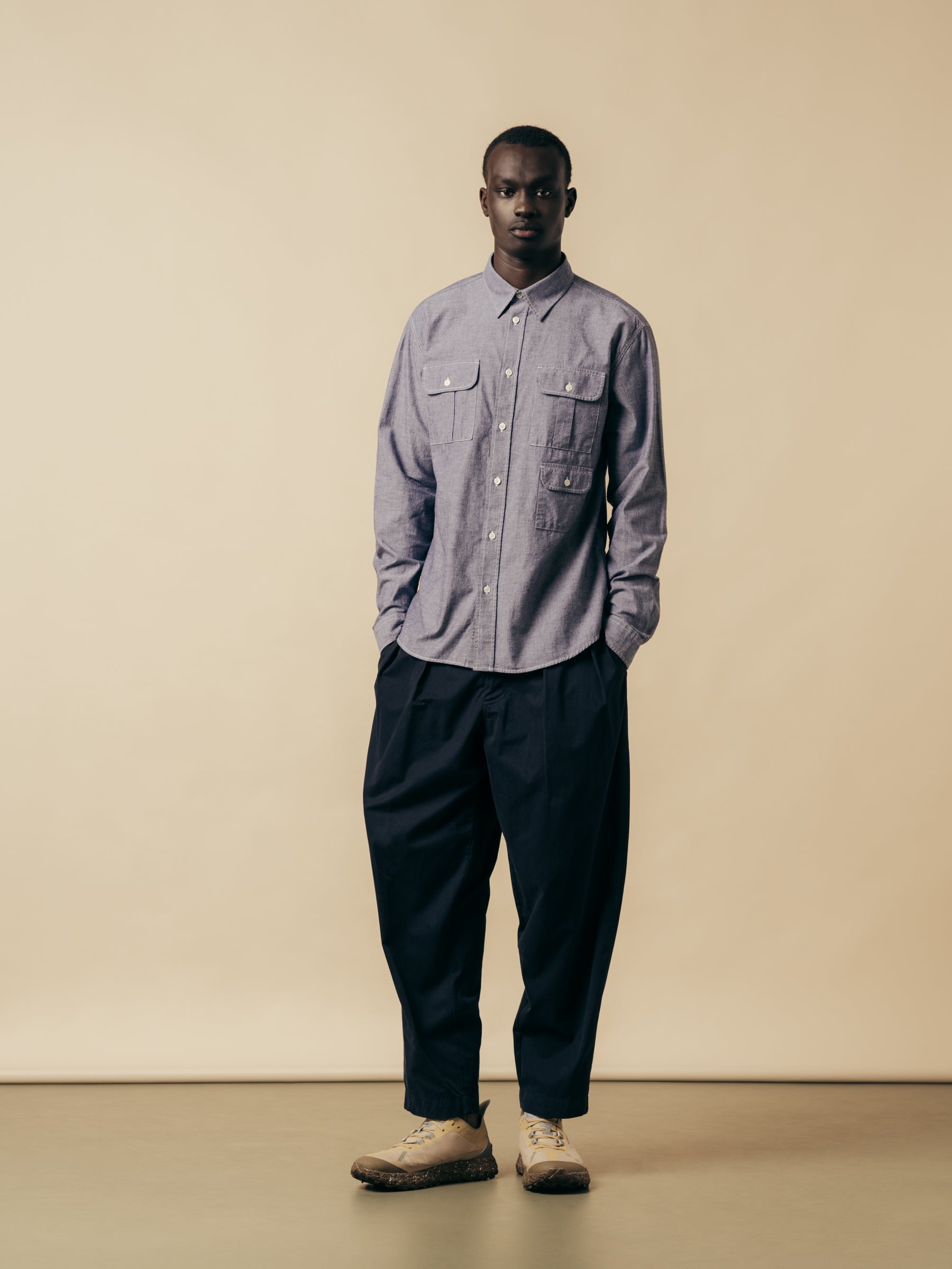 A model wearing a chambray shirt from menswear brand KESTIN.