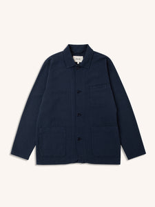 A navy blue men's chore coat from Scottish designer KESTIN, on a white background.