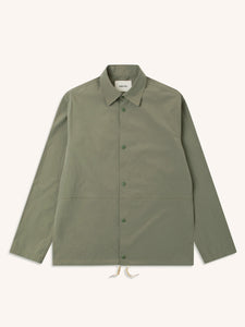 A technical men's coach jacket in olive green, on a white background.