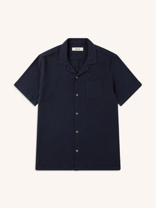 A plain dark navy short sleeve shirt, on a white background.