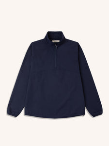 A navy blue zip neck jacket, made from nylon ripstop, on a white background.