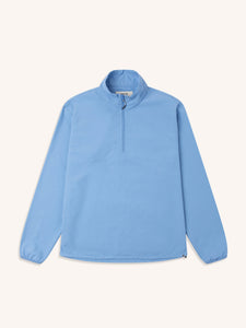 A bright blue zip-neck technical pullover from menswear brand KESTIN.