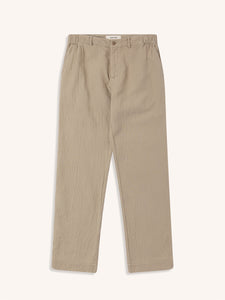 A pair of pale green/khaki trousers from KESTIN, on a white background.