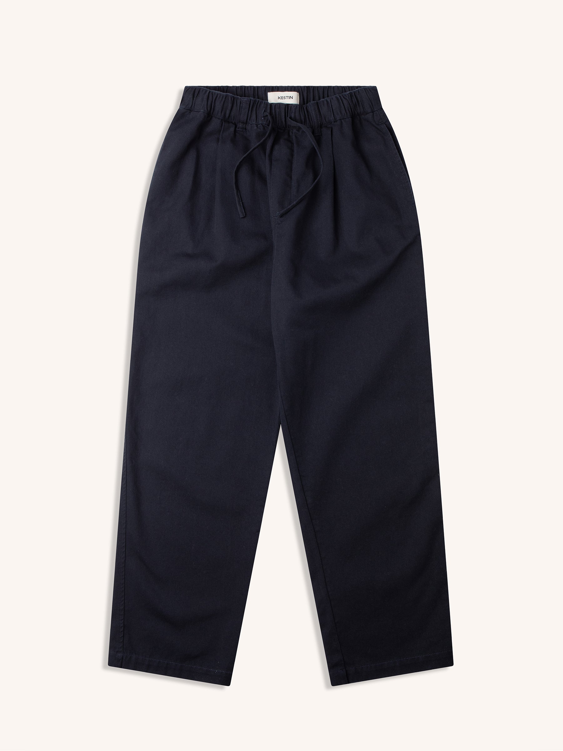 A pair of relaxed fit trousers from menswear brand KESTIN, on a white background.