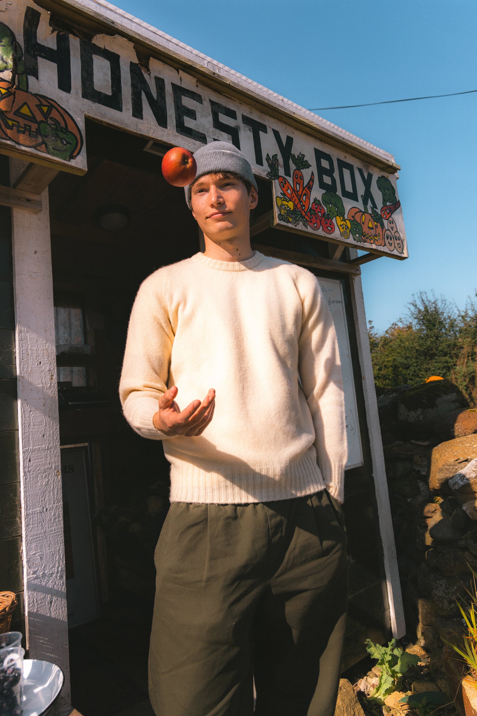 A model wearing a Shetland wool sweater, made in Scotland.