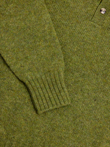 The cuff of the Lewis Shetland Wool Polo in green, from menswear brand KESTIN.