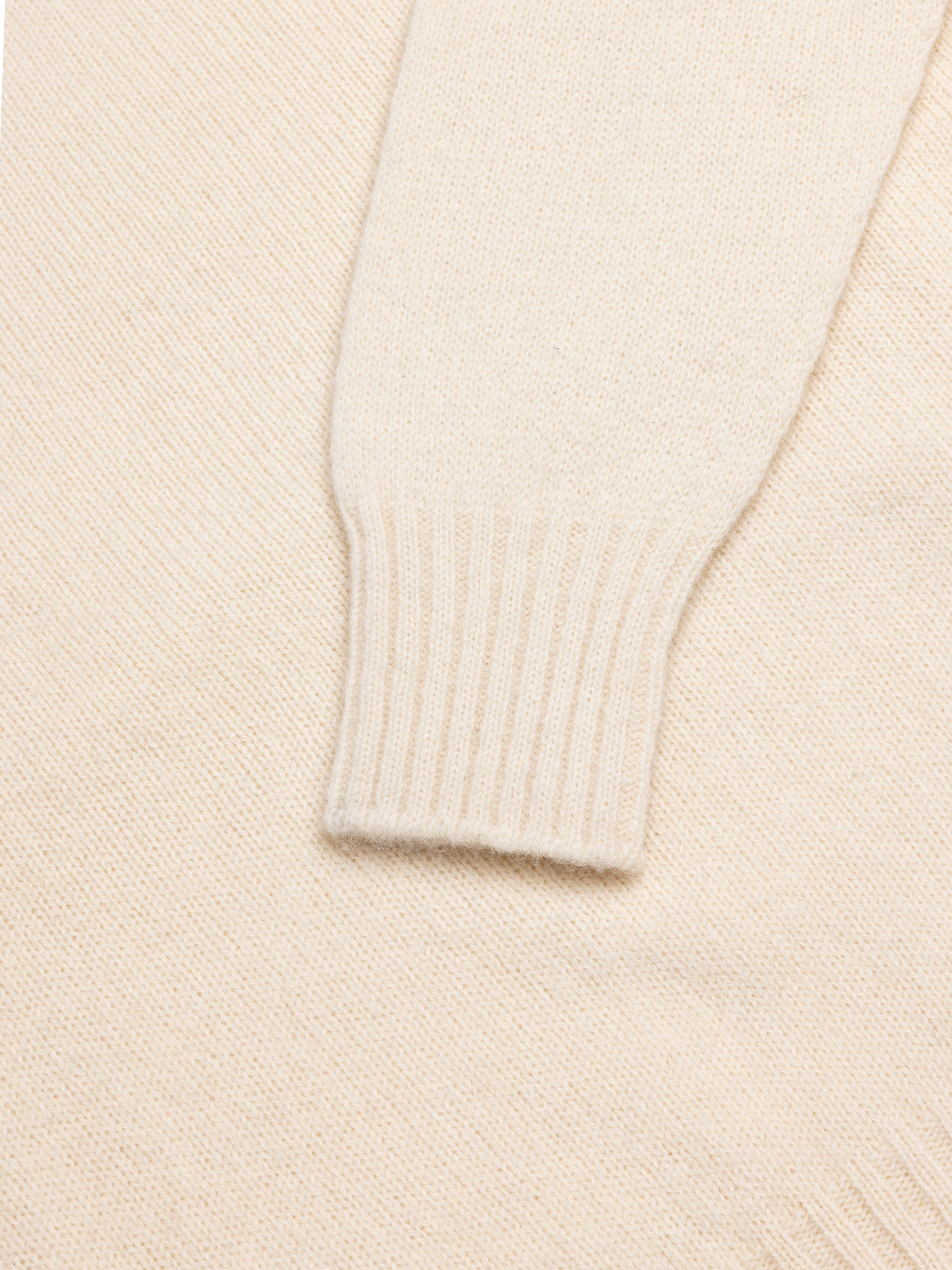 A close-up of the cuff of the Brushed Shetland Crew Neck by KESTIN.