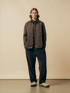 A model wearing a layered winter outfit from menswear brand KESTIN.