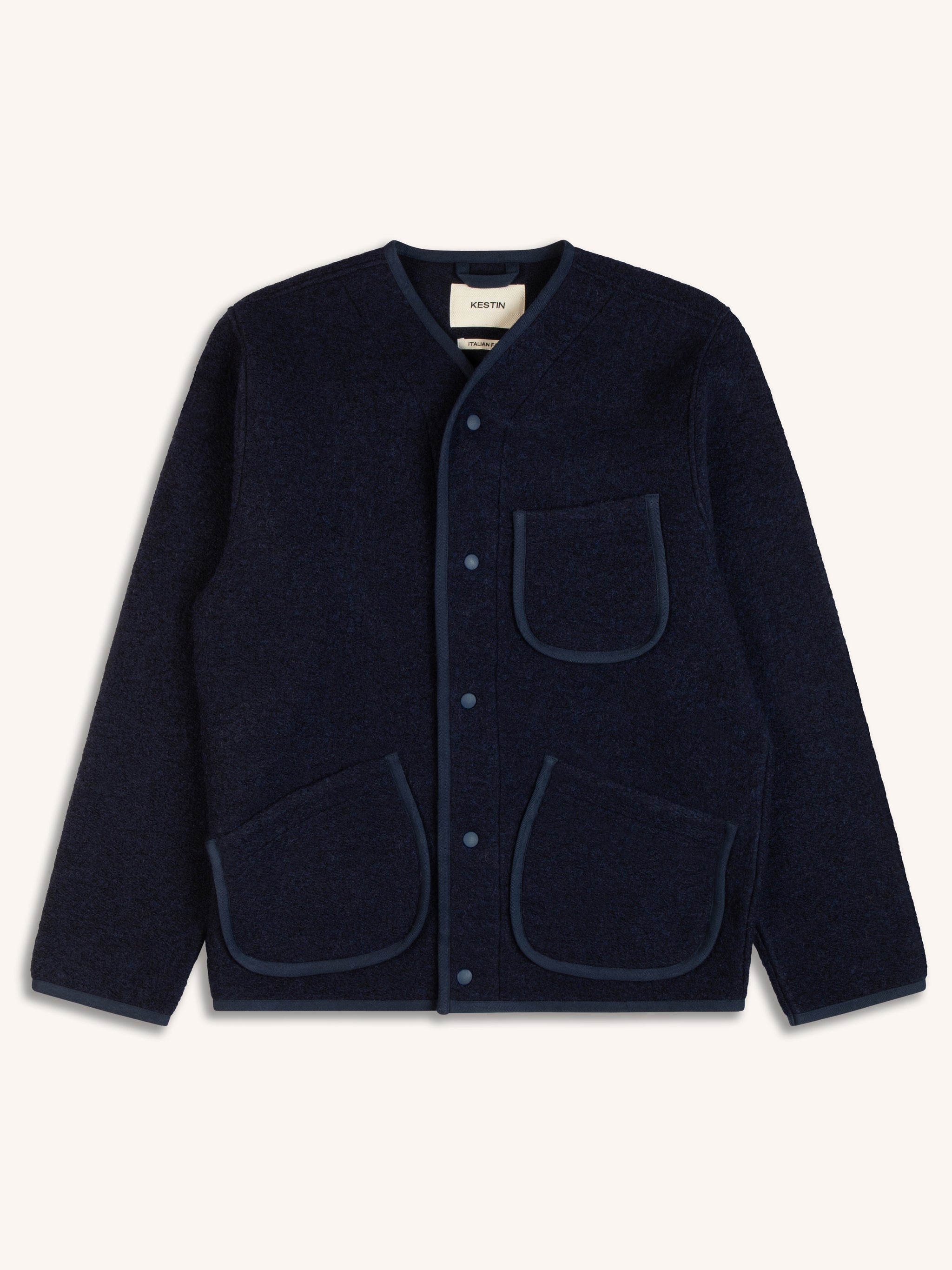 A navy blue fleece from Scottish designer brand KESTIN, on a white background.