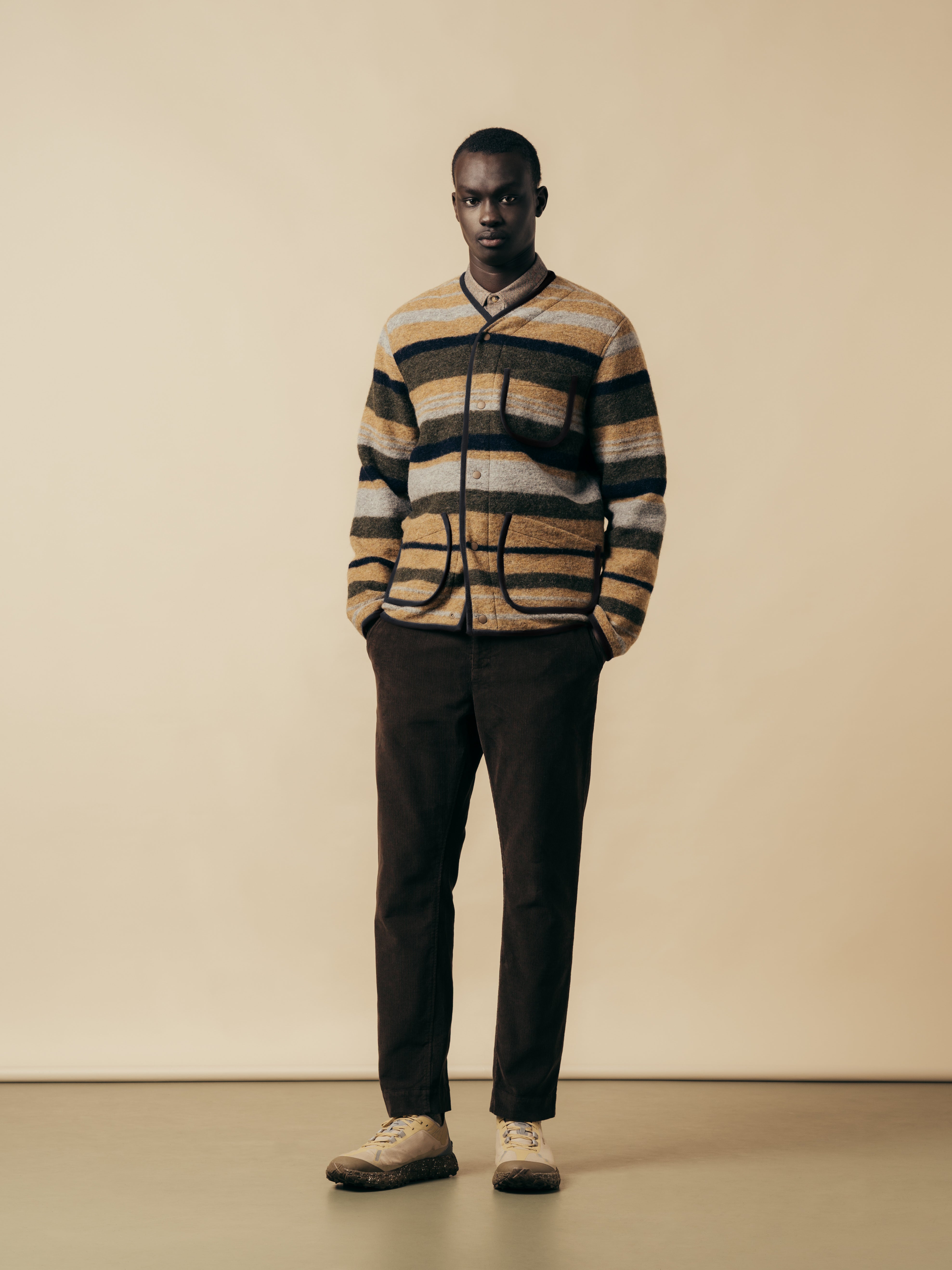 A model wearing a layered autumn outfit from Scottish menswear designer KESTIN.