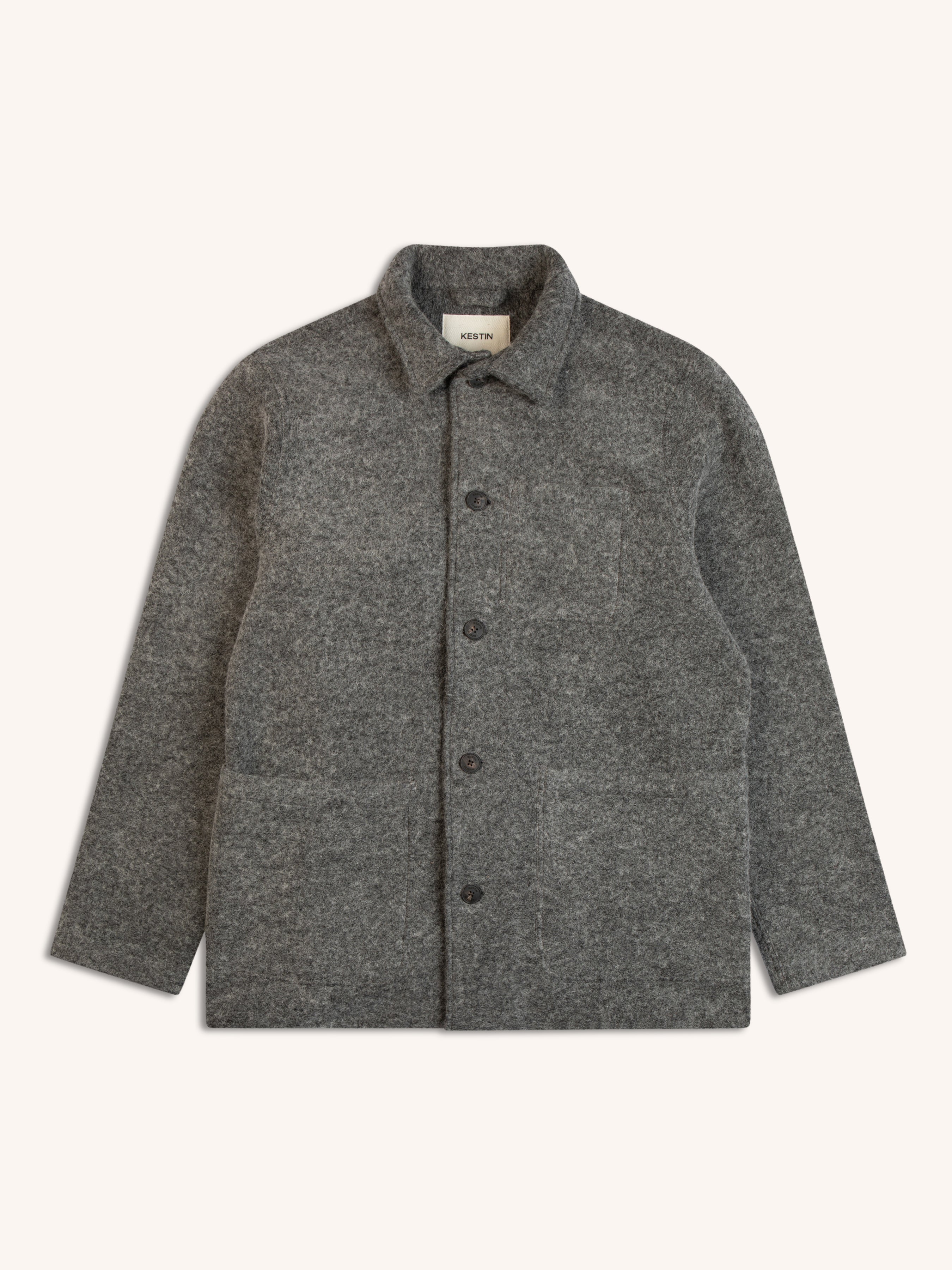 An Italian wool jacket in grey, on a white background, designed by menswear brand KESTIN.