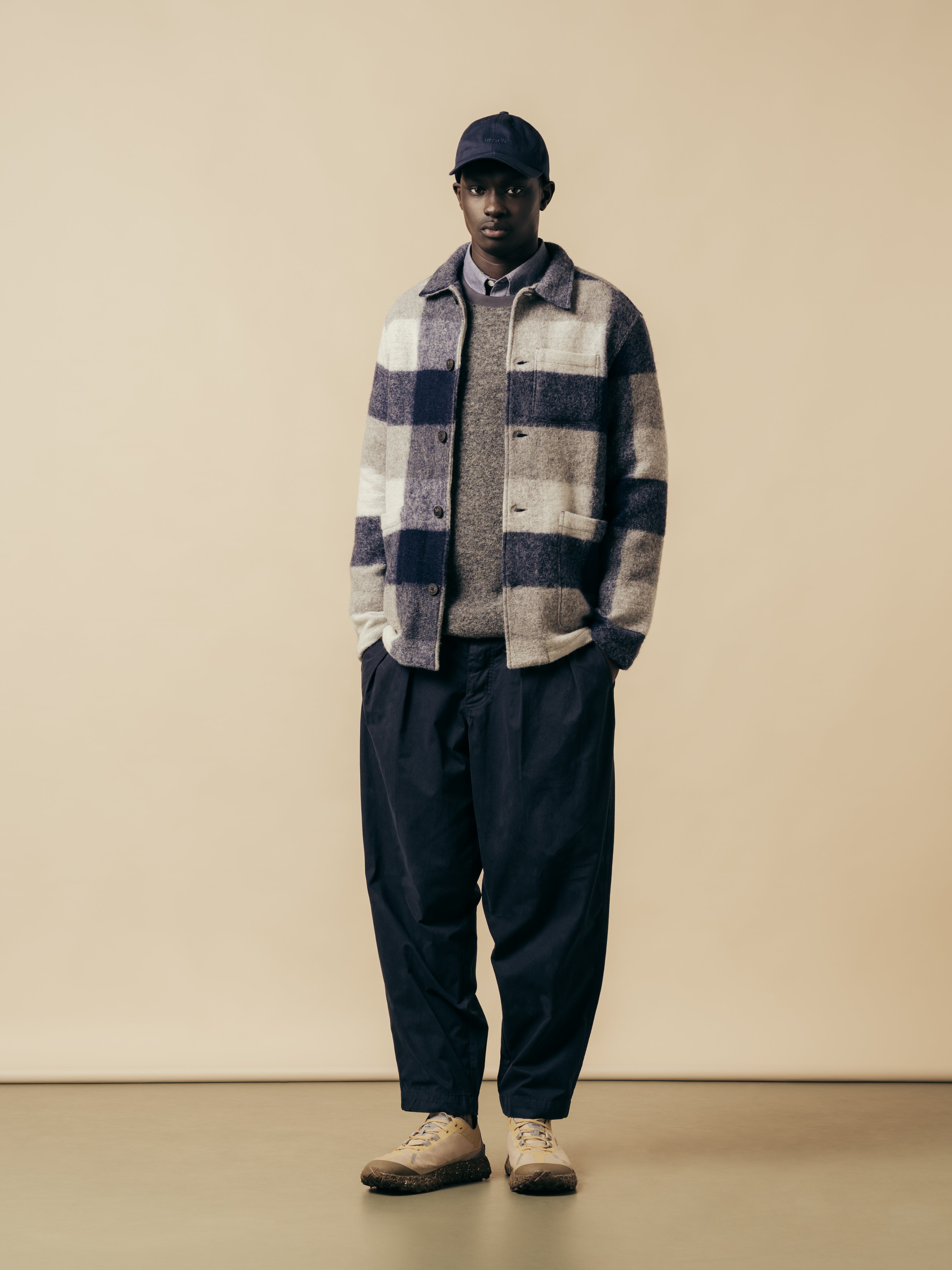 A model wearing a layered winter outfit from Scottish menswear designer KESTIN.