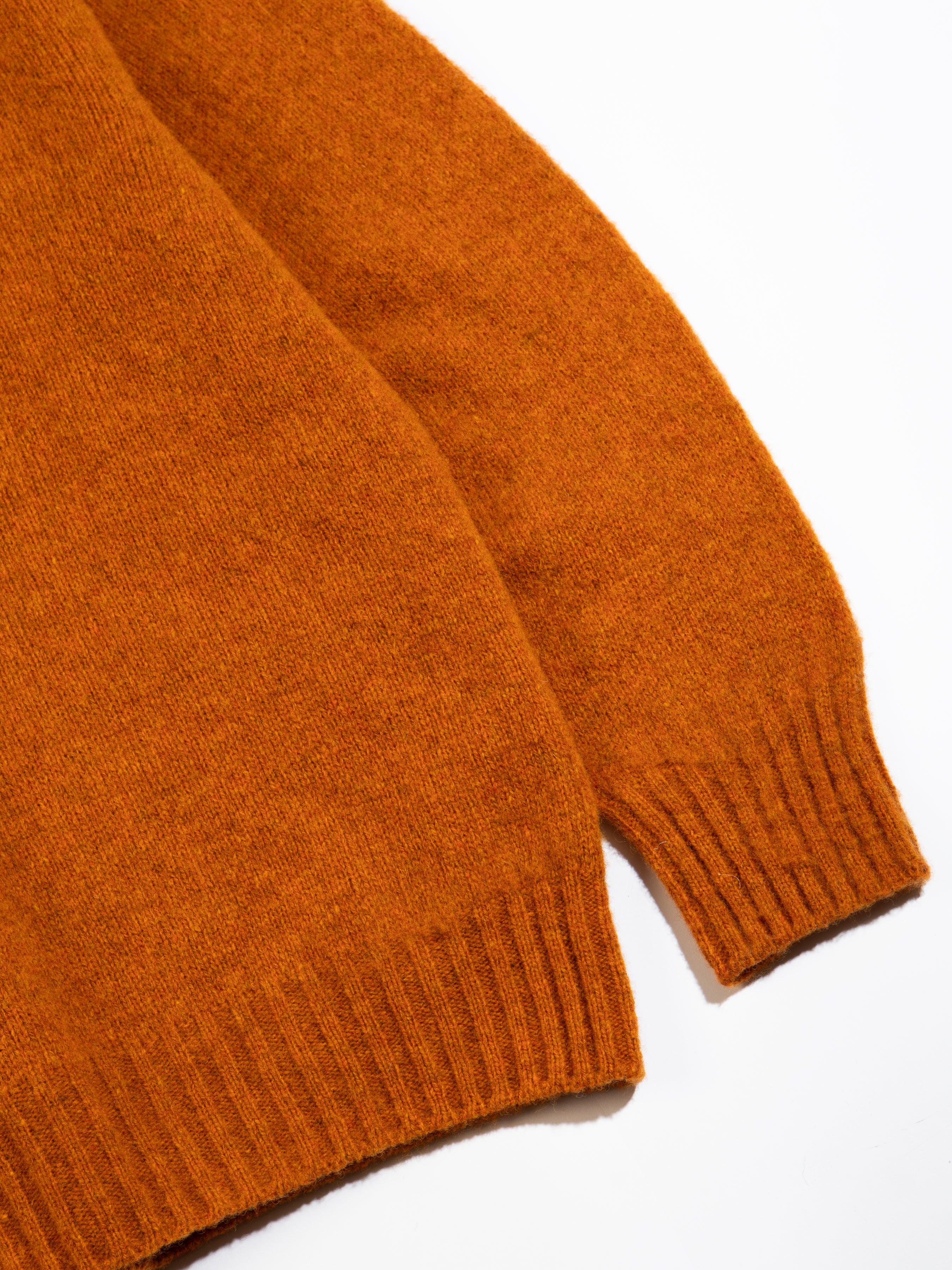 A close-up of the hem and cuff of the KESTIN Shetland Crew Neck.