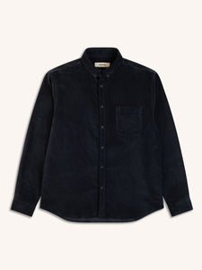 A long sleeve shirt in a dark blue moleskin fabric, on a white background.