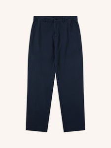 A pair of navy blue trousers from designer brand KESTIN, on a white background.