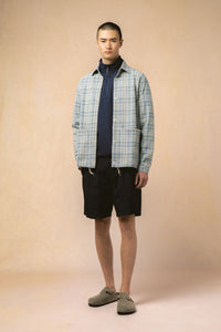 A model wearing an early spring outfit from Scottish menswear designer KESTIN.