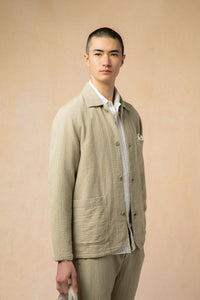 A model wearing a casual textured suit from menswear brand KESTIN.