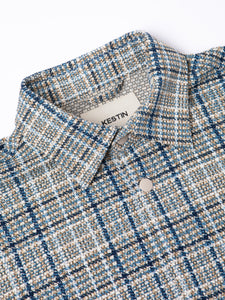 A close-up of the collar of the KESTIN Armadale Jacket in an Italian check fabric.