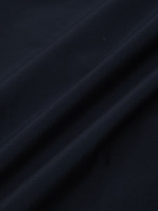 A navy blue technical fabric from 37.5, used by menswear brand KESTIN.